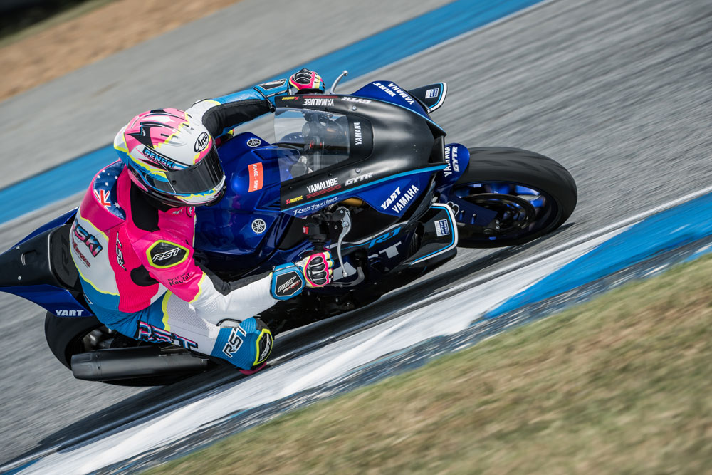 Sportsbike leaned over on track while testing the Bridgestone RS12